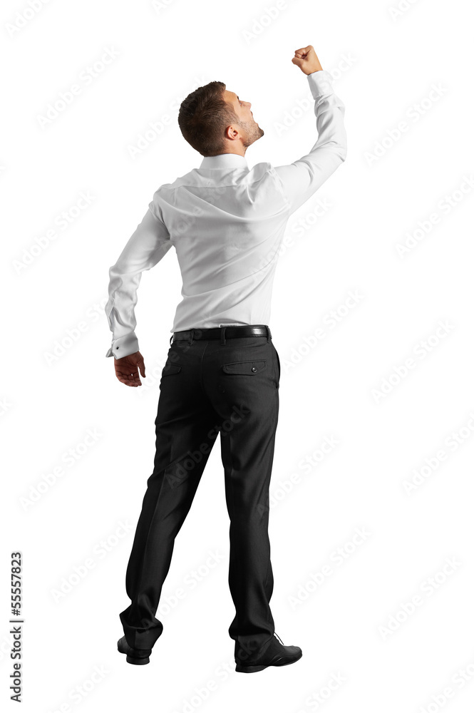 man looking up and showing fist man looking up and showing fist
