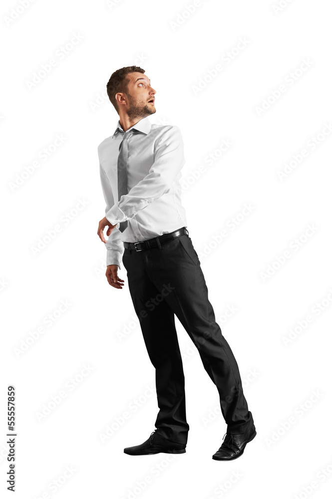 startled businessman looking around startled businessman looking around