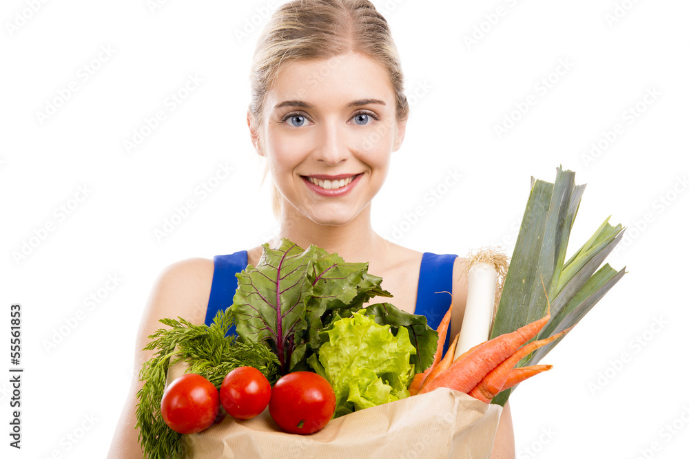 Beautiful woman carrying vegetables Beautiful woman carrying vegetables