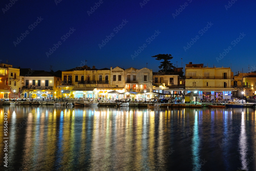 Old Venetian harbour in the evening in city of Rethymno, Crete