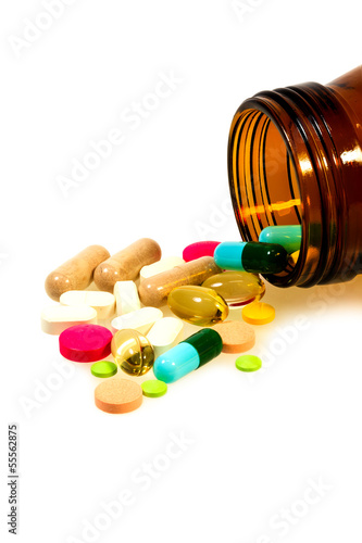 Various medicine and bottle on white background