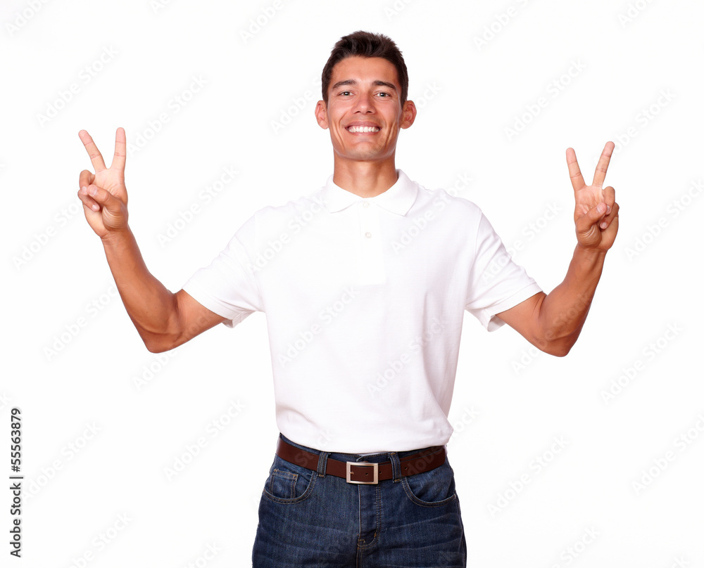 Cheerful man in white t-shirt with finger sign. Cheerful man in white t-shirt with finger sign.