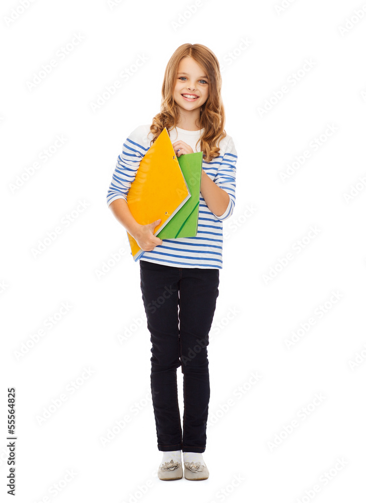 child holding colorful folders child holding colorful folders