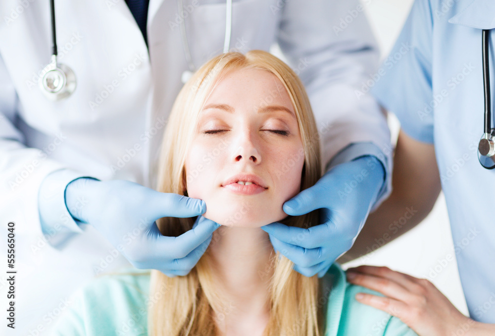 plastic surgeon or doctor with patient plastic surgeon or doctor with patient