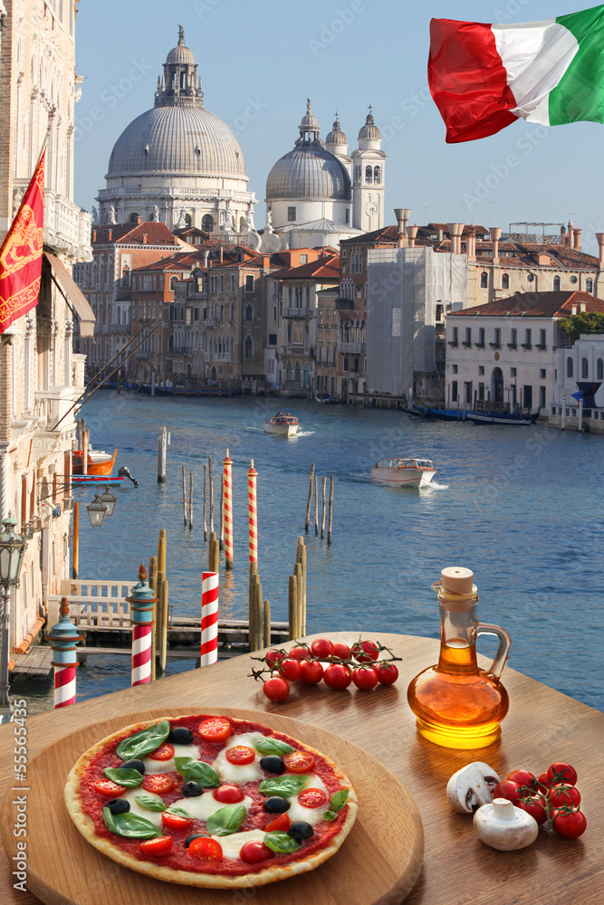 Fototapeta premium Classic Italian pizza in Venice against canal, Italy