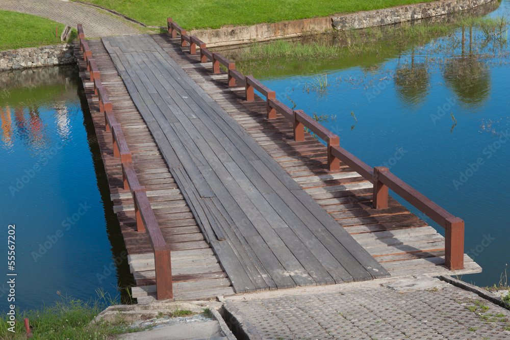 Wood Bridge Over the Water in Golf Course