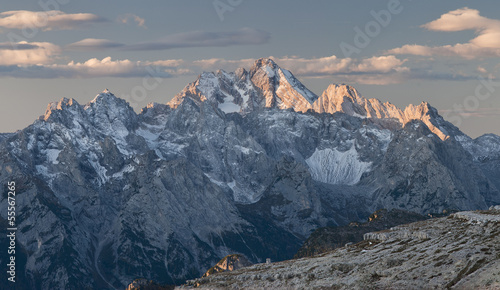 Golden painted summits of Dolomity at dawn - Panorama photo