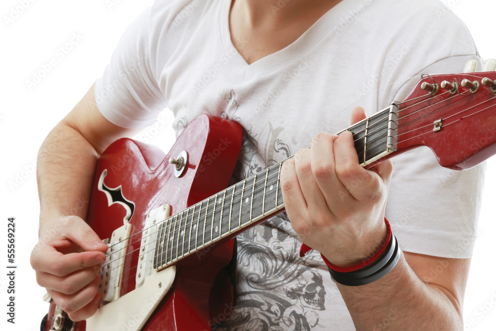 Fototapeta premium Rocker with his classic acoustic guitar against white background