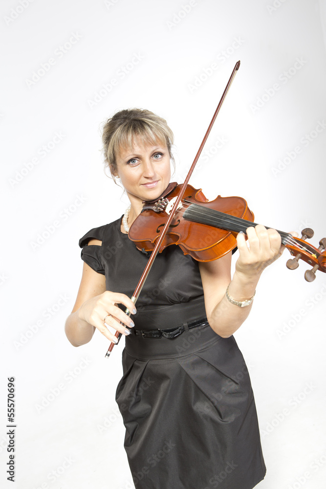 Young woman is playing violin