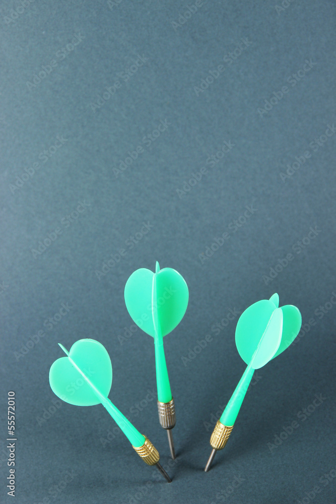 Darts on gray background Darts on gray background