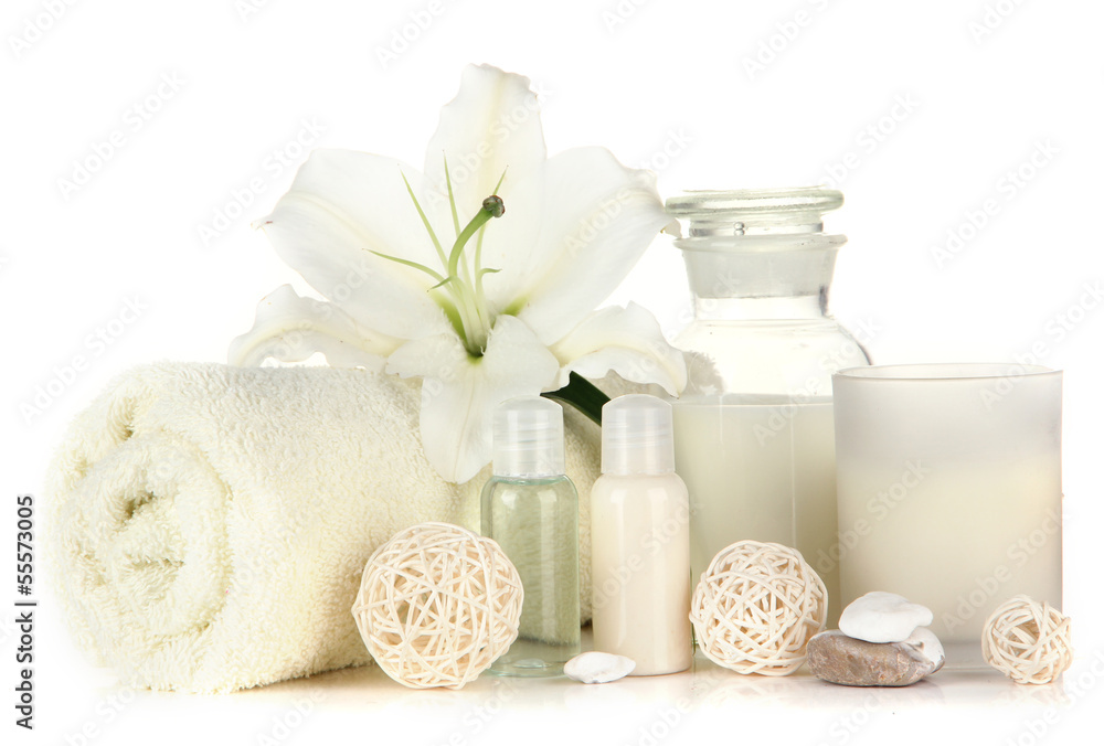 Beautiful spa setting with lily isolated on white Beautiful spa setting with lily isolated on white