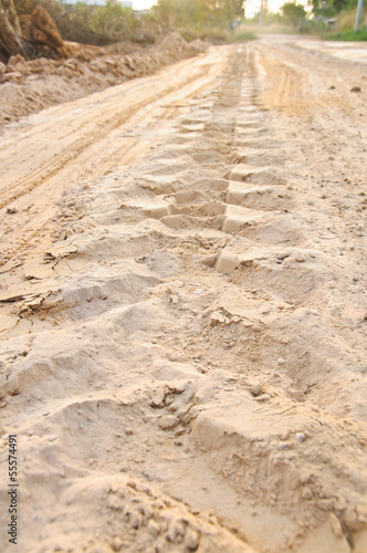 Off road 4X4 wheel tracks on country desert beach road sand moto