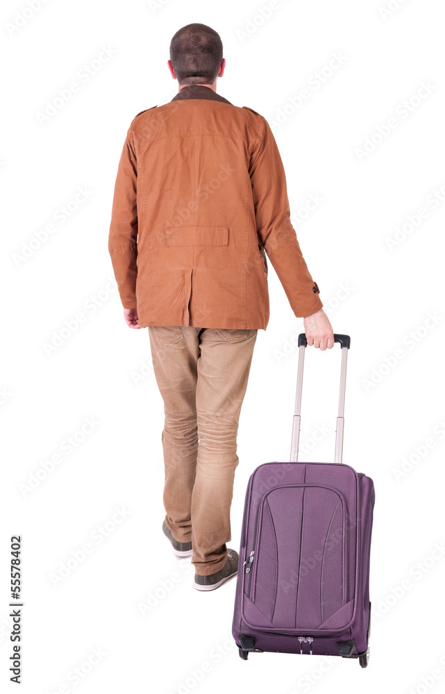 Back view of stylishly dressed man in a brown jackett with suit Back view of stylishly dressed man in a brown jackett with suit