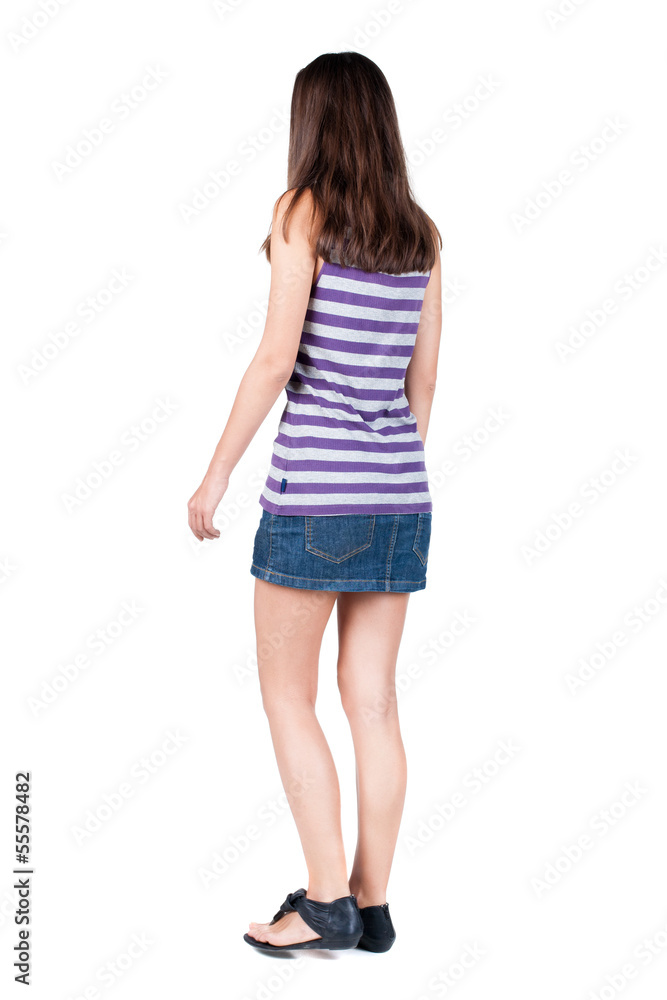 back view of walking woman . back view of walking woman .
