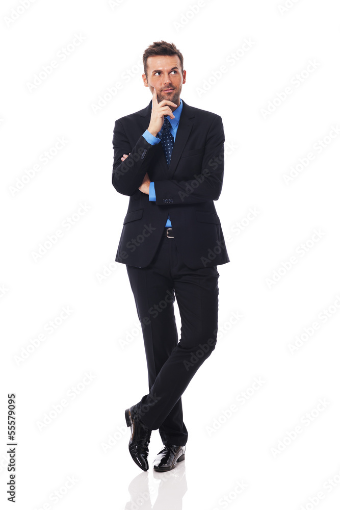 Handsome businessman thinking about something Handsome businessman thinking about something