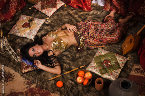 Photos Beautiful belly dancer in the arabic harem interior