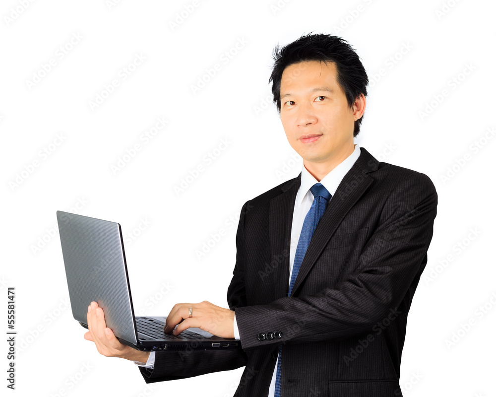 Asian business man with a laptop computer over white Asian business man with a laptop computer over white