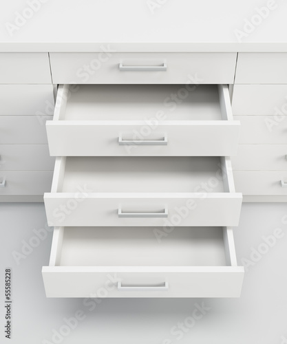 cupboard with opened drawers