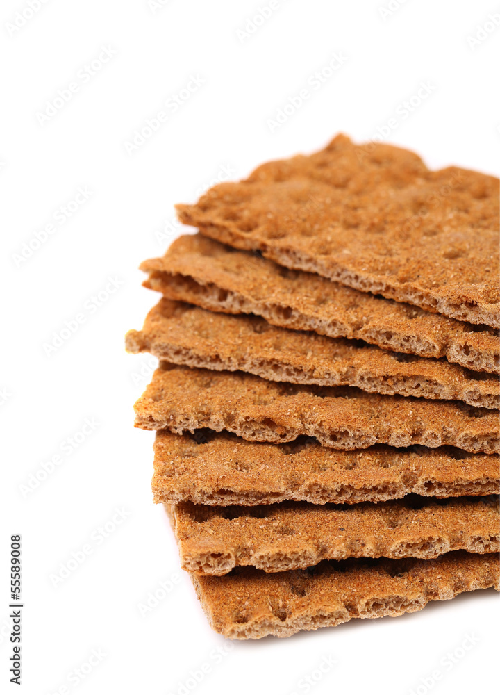 Whole grain crisp bread isolated on white Whole grain crisp bread isolated on white