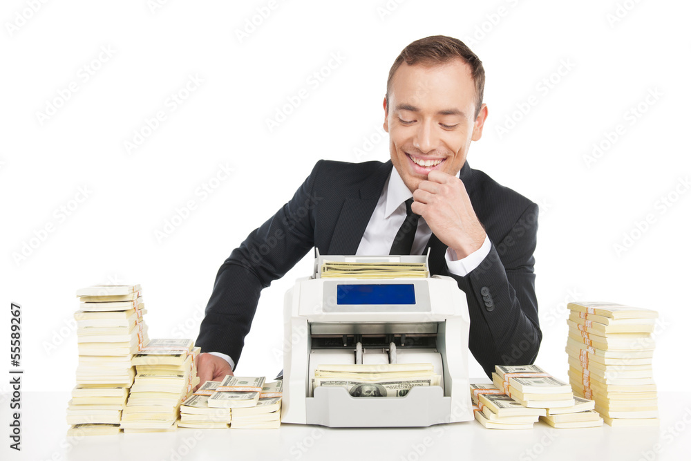 Man counting money. Cheerful young businessman counting money on Man counting money. Cheerful young businessman counting money on