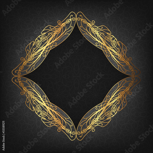 Openwork gold frame in antique style on a dark background. The i