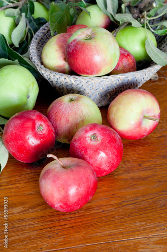 fresh summer apples on wooden table