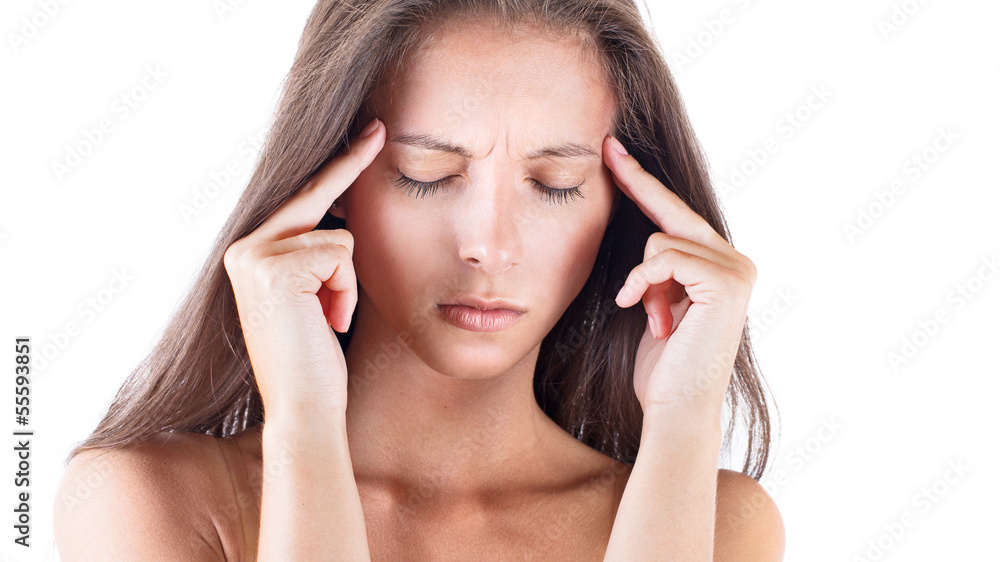 Portrait of woman suffering from a terrible headache Portrait of woman suffering from a terrible headache