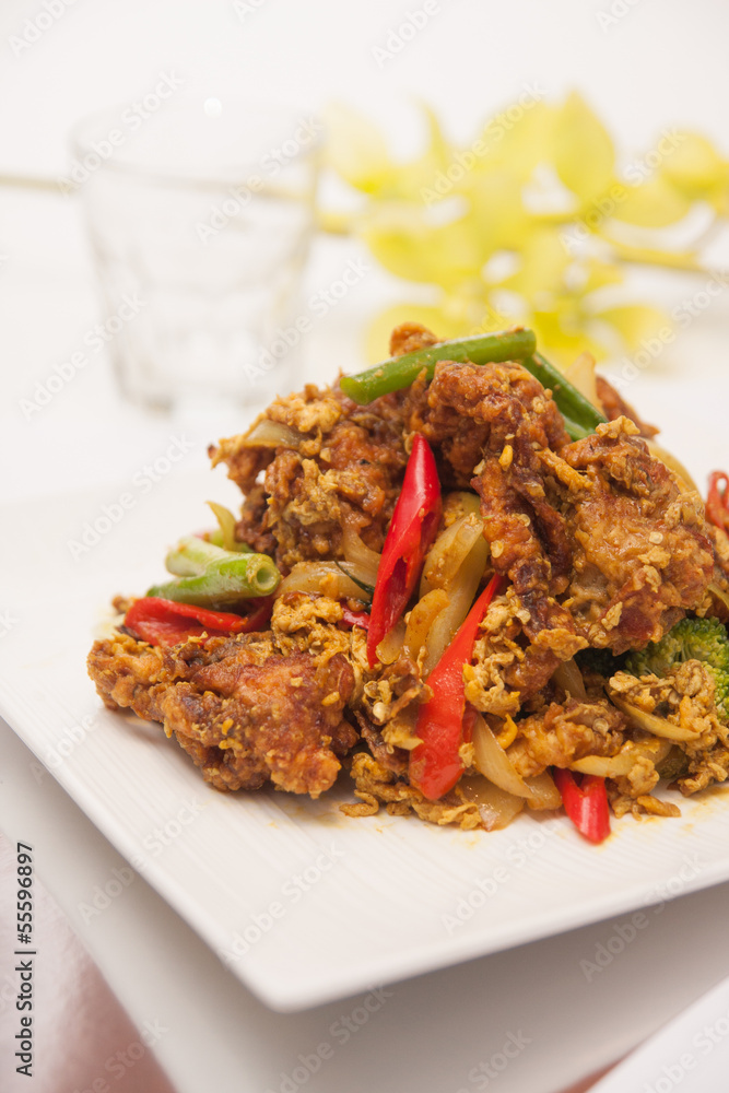 Deep fried soft shell crab with curry powder, Thai food.