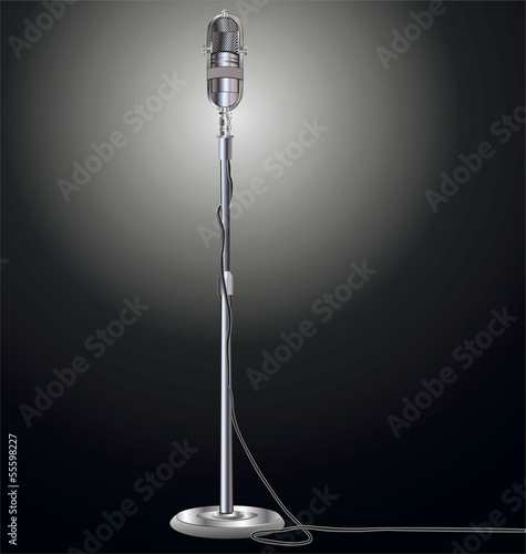 Vintage microphone isolated on black background