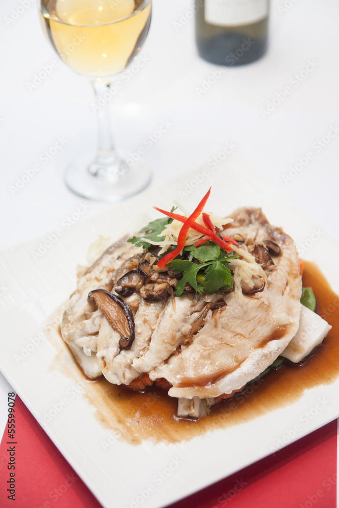 Steam fish fillet with soy sauce.