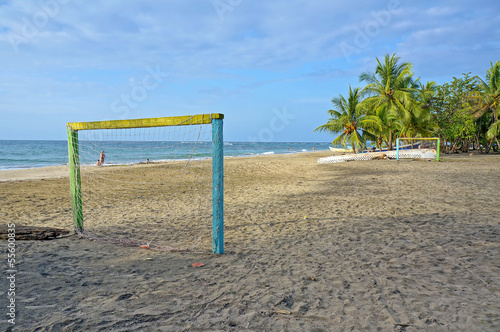Tropical beach with football goal