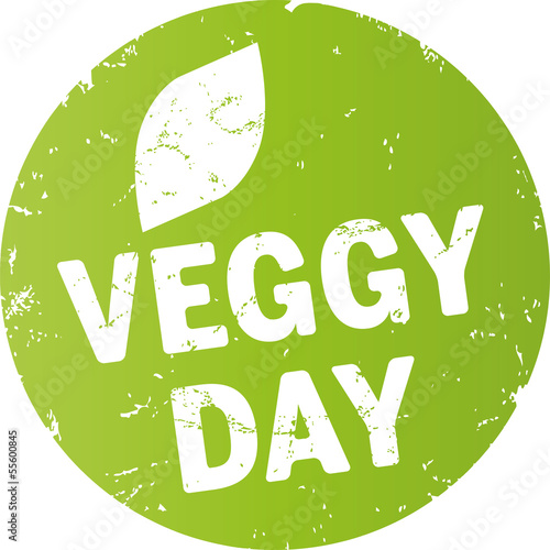 grüner runder button veggy day mit blatt