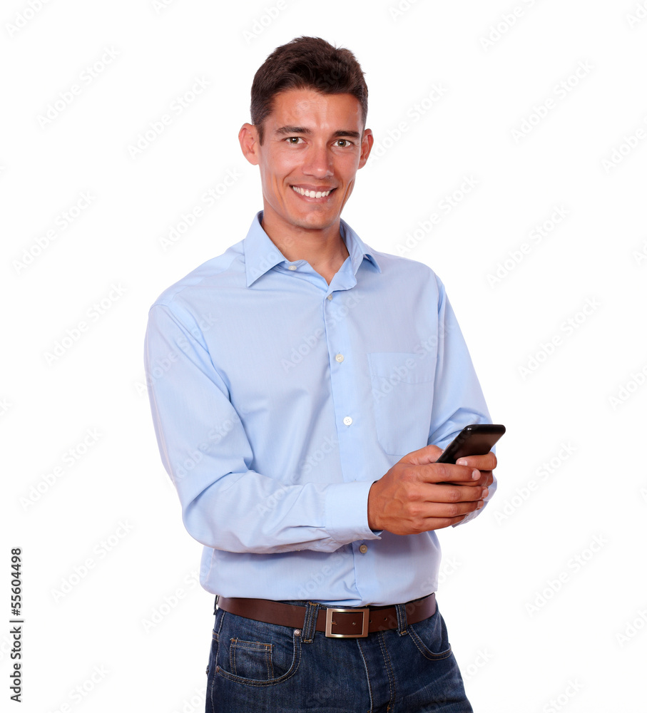 Adult stylish man texting and smiling Adult stylish man texting and smiling