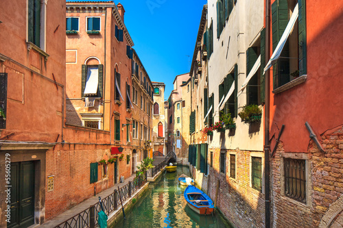 Venice cityscape, water canal, bridge and buildings. Italy