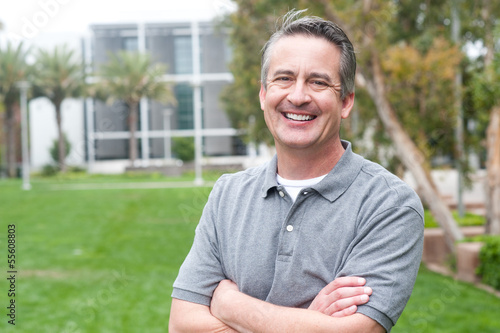 casual portrait of a mature, happy man