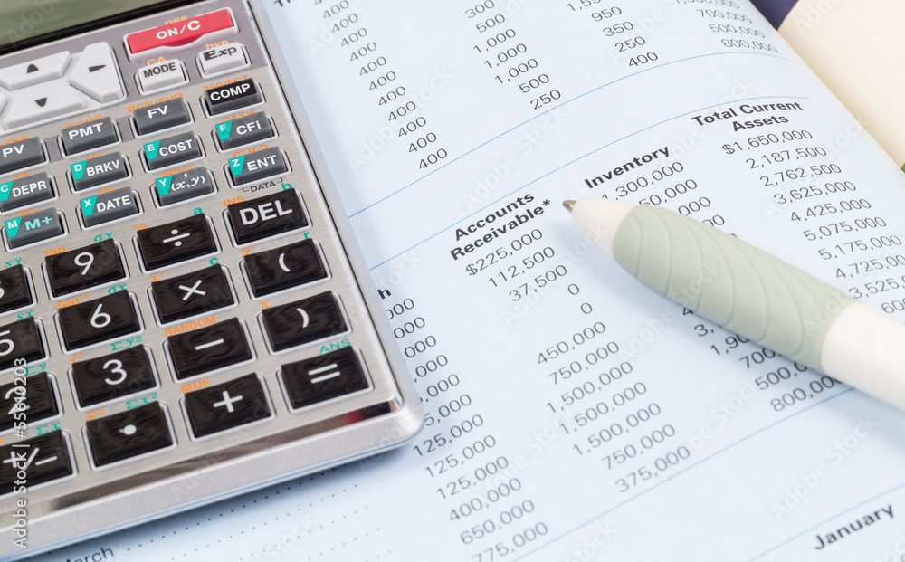 Calculator , book and pen Calculator , book and pen