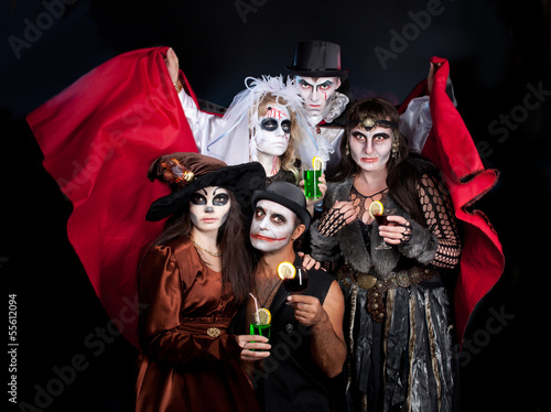 man and woman  wearing  as  vampire and witch. Halloween