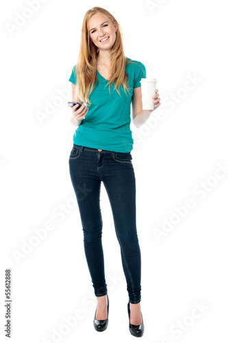 Beautiful woman with a mobile and coffee