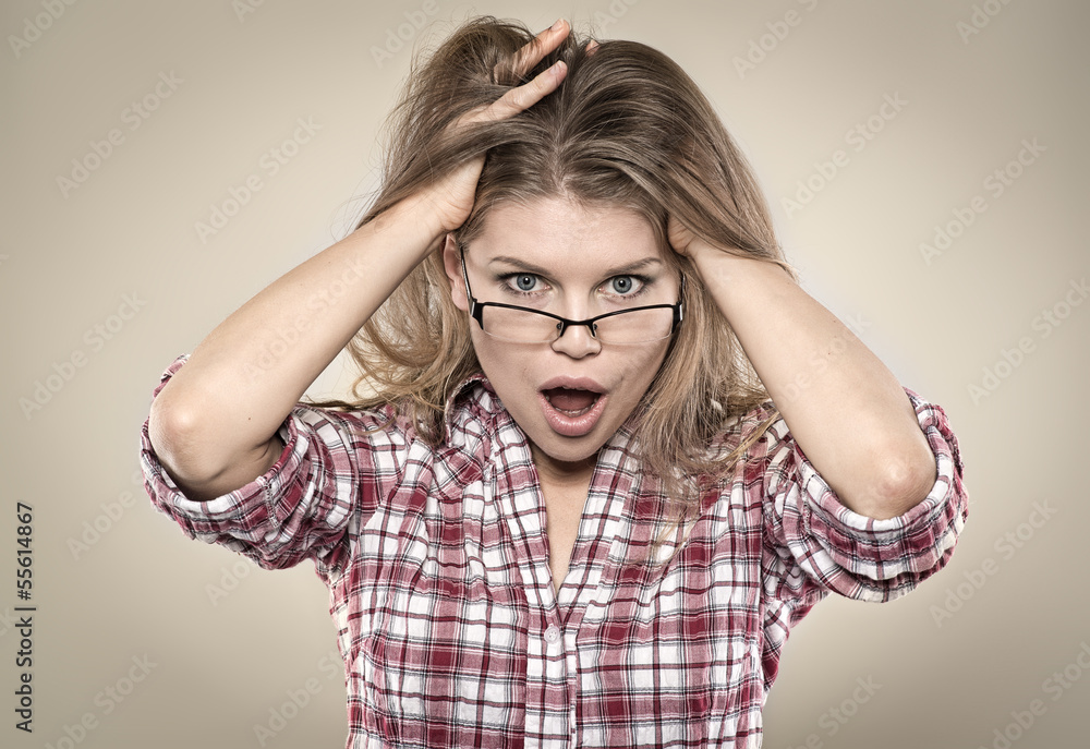 Portrait of pretty girl surprised or shocked with open moutn Portrait of pretty girl surprised or shocked with open moutn