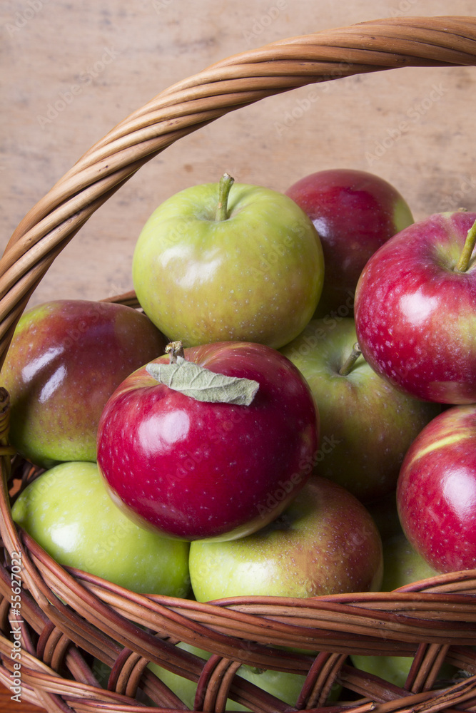 apples in a wicker basket apples in a wicker basket