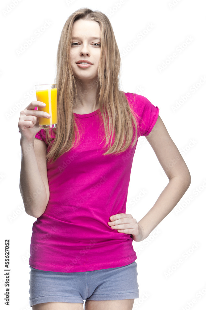 young beautiful blond woman drinking orange juice young beautiful blond woman drinking orange juice