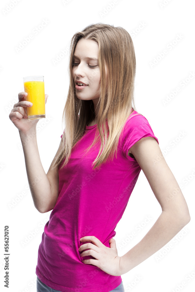 young beautiful blond woman drinking orange juice young beautiful blond woman drinking orange juice