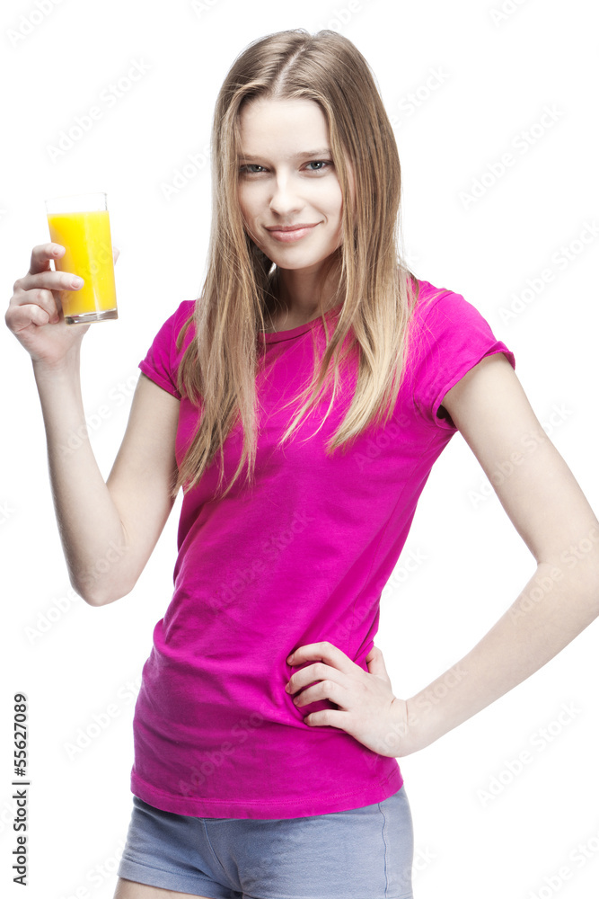 young beautiful blond woman drinking orange juice young beautiful blond woman drinking orange juice