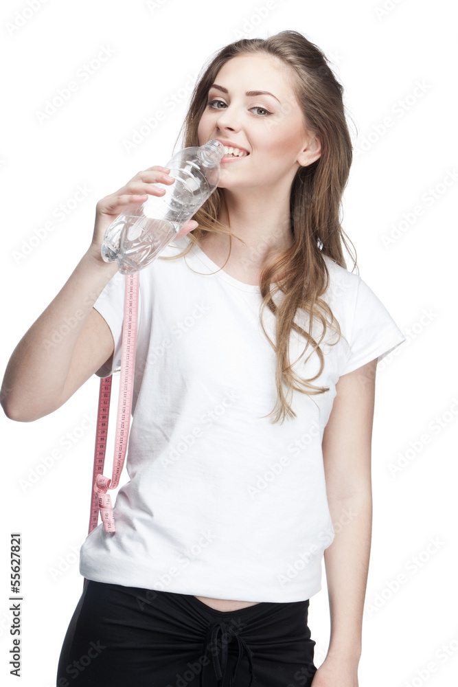 young beautiful brunette woman drinking water young beautiful brunette woman drinking water