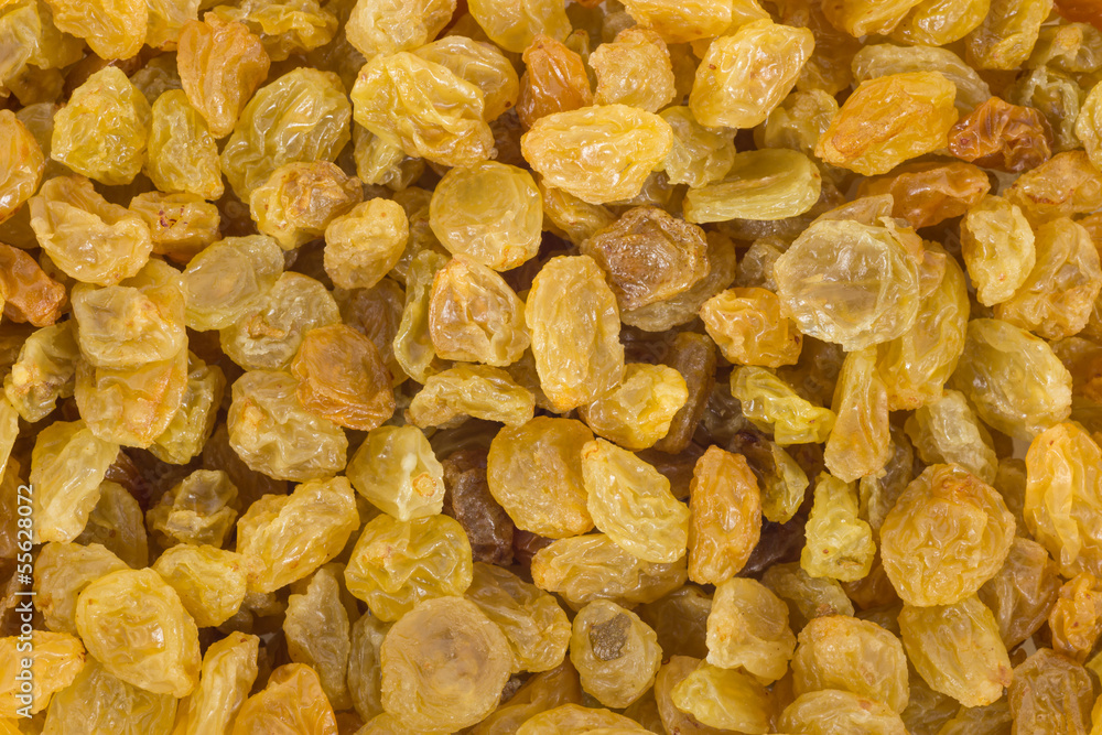 Golden raisins background Golden raisins background