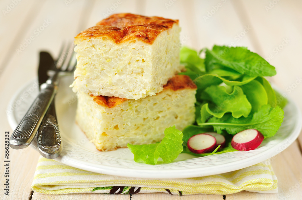 Squares of Zucchini and Rice Bake with Green Salad and Radishes