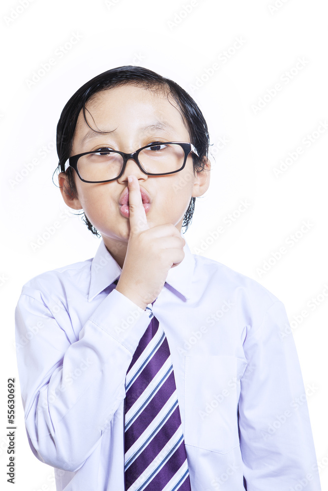 Be quiet. Little businessman gesture on white Be quiet. Little businessman gesture on white