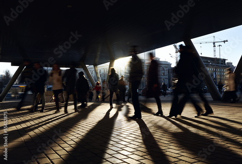 People walking near the metro station.