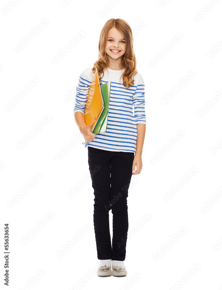 child holding colorful folders child holding colorful folders