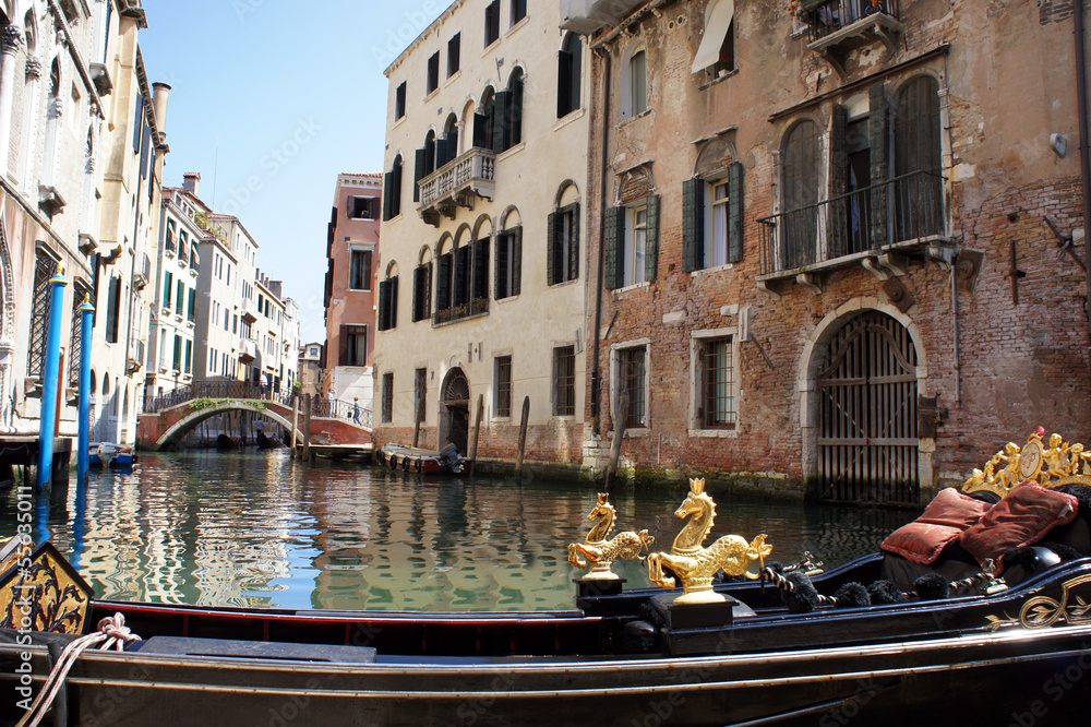 Gondola on canal in Venice